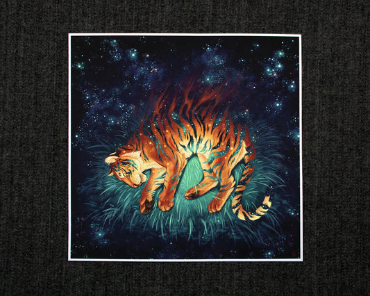 Square print of a fantasy tiger sleeping on grass, with a starry space background. Parts of the tiger are melding and drifting off in the background whilst the stripes show the starry sky behind